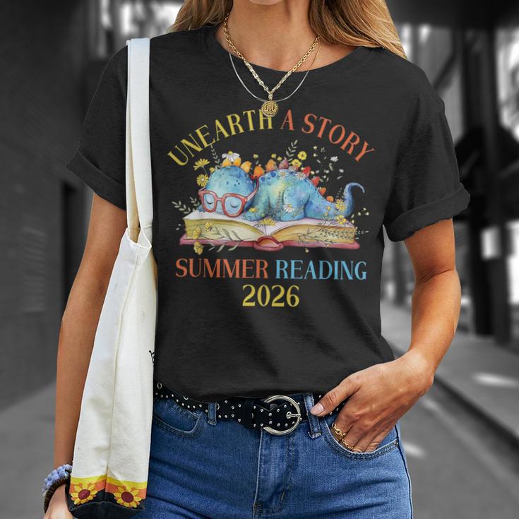 Unearth a Story Summer Reading 2026 Dinosaur Books Dino T-Shirt Gifts for Her Unearth a Story Summer Reading 2026 Dinosaur Books Dino T-Shirt Gifts for Her