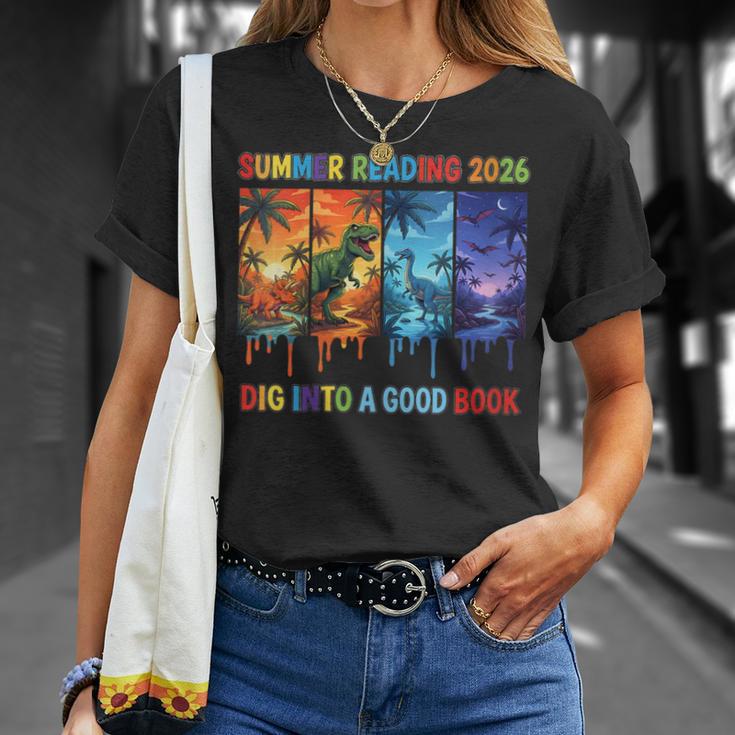 Women's Summer Reading 2026 Unearth A Story Dinosaur Books T-Shirt Gifts for Her