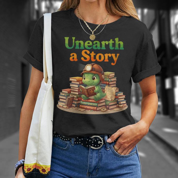 Women's Unearth a Story Summer 2026 Dinosaur Reading Books Dino T-Shirt Gifts for Her