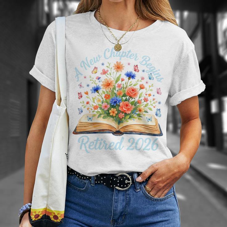 New Chapter Begins Retired 2026 Watercolor Floral Book Women Premium Tri-Blend T-Shirt Gifts for Her