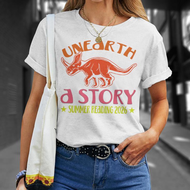 Unearth a Story Summer Reading 2026 Triceratops Dino Book Premium Tri-Blend T-Shirt Gifts for Her Unearth a Story Summer Reading 2026 Triceratops Dino Book Premium Tri-Blend T-Shirt Gifts for Her