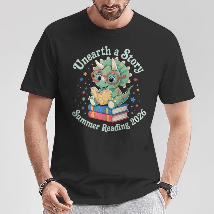 Unearth a Story Summer Reading 2026 Cute Dinosaur Book Lover T-Shirt Unique Gifts Unearth a Story Summer Reading 2026 Cute Dinosaur Book Lover T-Shirt Unique Gifts