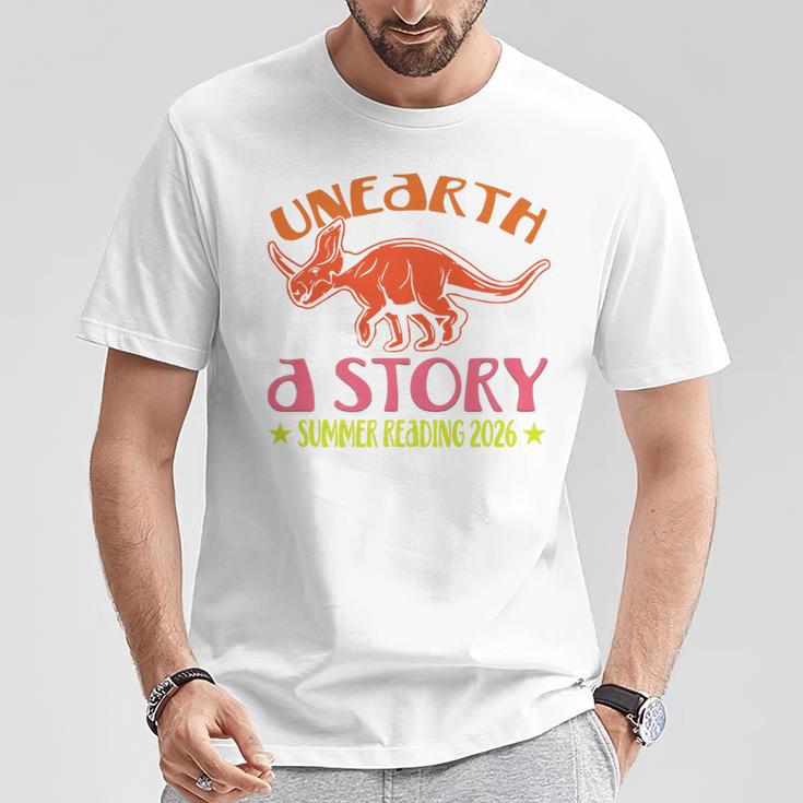 Unearth a Story Summer Reading 2026 Triceratops Dino Book Premium Tri-Blend T-Shirt Unique Gifts Unearth a Story Summer Reading 2026 Triceratops Dino Book Premium Tri-Blend T-Shirt Unique Gifts