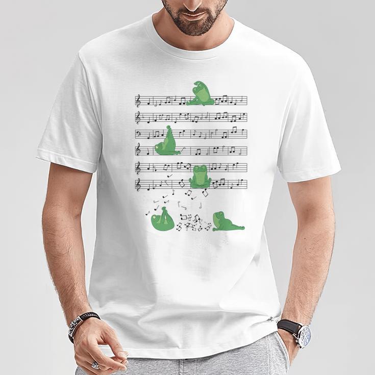 ヨガをしているかわいいカエル 音符 音記号 ミュージシャンアート 長袖tシャツ Tシャツ 面白い贈り物