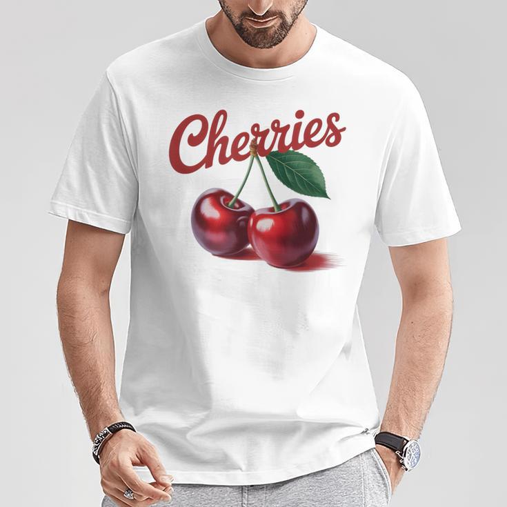 レトロなさくらんぼのイラスト 大胆な赤い果実 ヴィンテージ付き Tシャツ 面白い贈り物