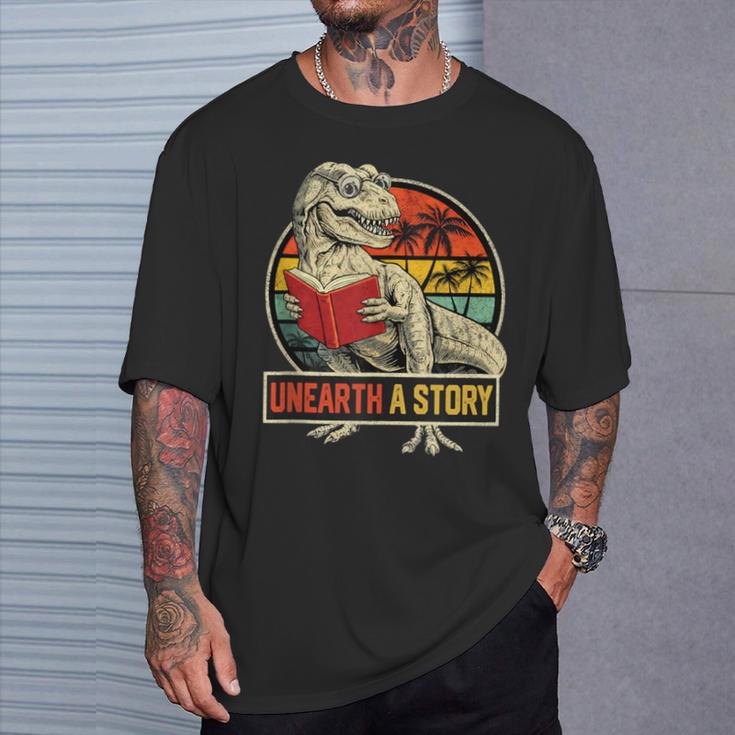 Unearth a Story Dinosaur Reading Book DinoRex Summer 2026 T-Shirt Gifts for Him Unearth a Story Dinosaur Reading Book DinoRex Summer 2026 T-Shirt Gifts for Him