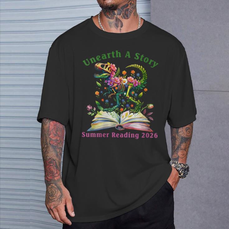 Women's Unearth A Story Summer Reading 2026 Dinosaur Book Floral T-Shirt Gifts for Him
