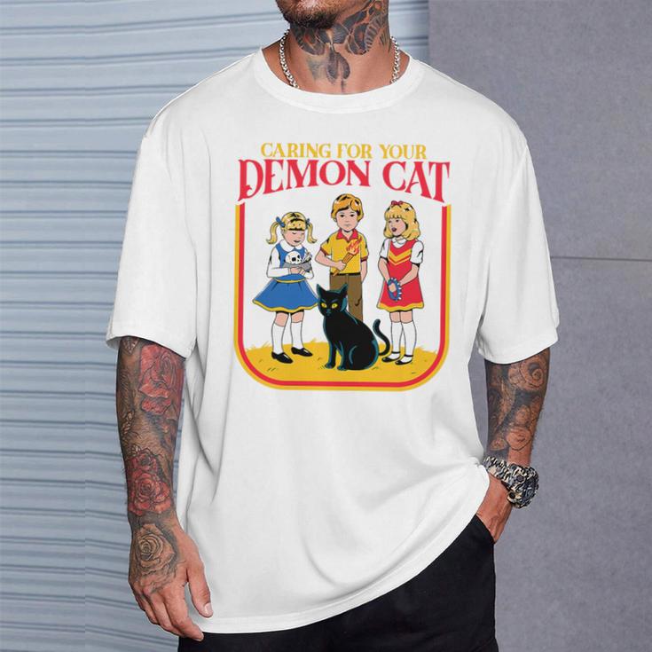 Caring For Your Evil Cat Retro Dark Humor Book Cover Premium Tri-Blend T-Shirt Gifts for Him