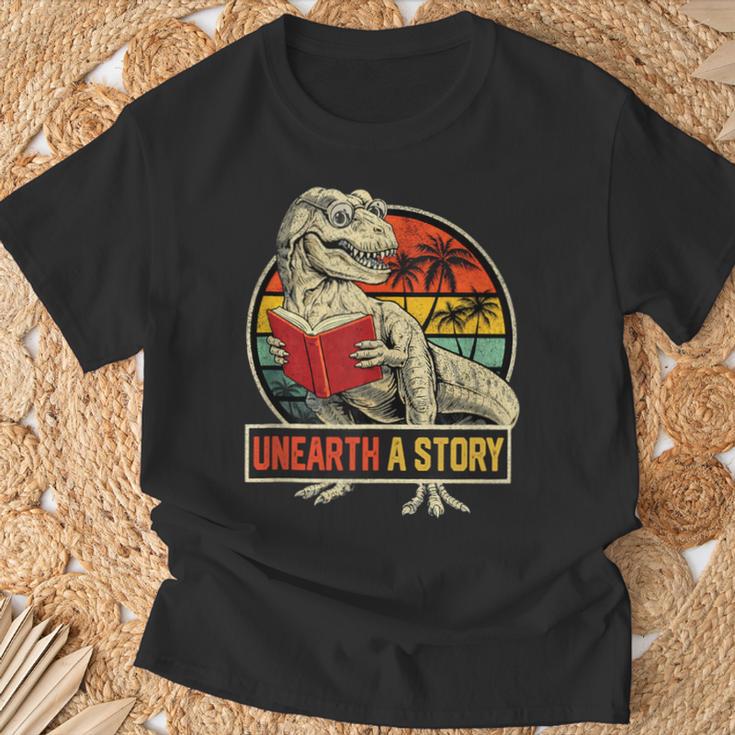 Unearth a Story Dinosaur Reading Book DinoRex Summer 2026 T-Shirt Gifts for Old Men Unearth a Story Dinosaur Reading Book DinoRex Summer 2026 T-Shirt Gifts for Old Men