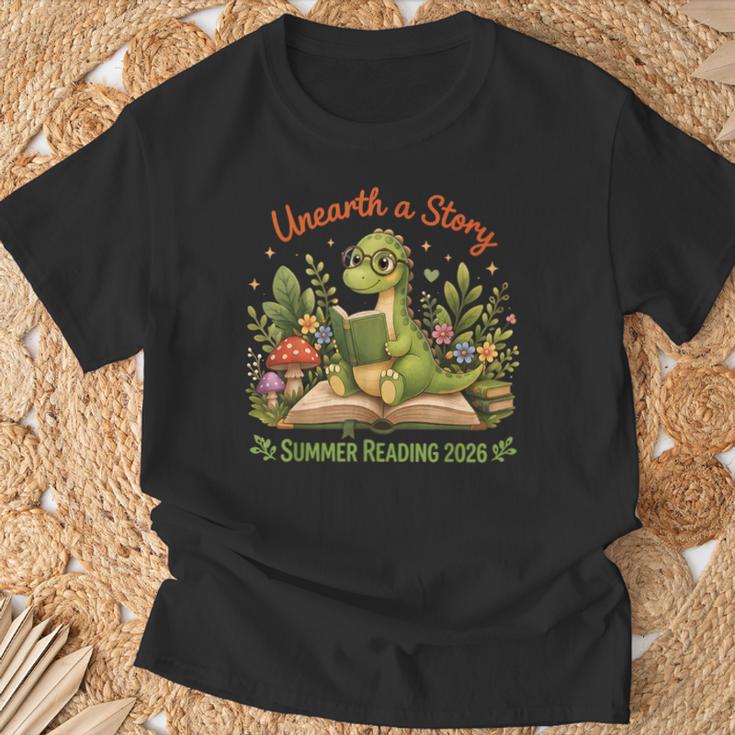 Unearth A Story Summer Reading 2026 Dinosaur Reading Books T-Shirt Gifts for Old Men Unearth A Story Summer Reading 2026 Dinosaur Reading Books T-Shirt Gifts for Old Men