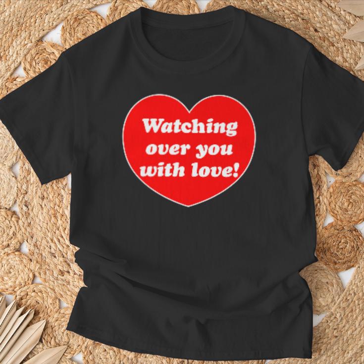 メルちゃんはあなたを見守っているよ！じーーーっ Tシャツ 高齢者への贈り物