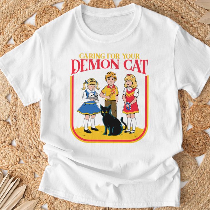 Caring For Your Evil Cat Retro Dark Humor Book Cover Premium Tri-Blend T-Shirt Gifts for Old Men