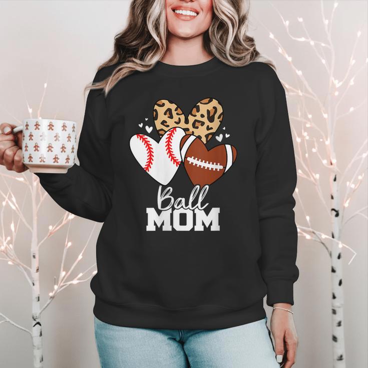 Ball Mom Football Baseball Mom Heart Women Crewneck Sweatshirt Ball Mom Football Baseball Mom Heart Women Crewneck Sweatshirt