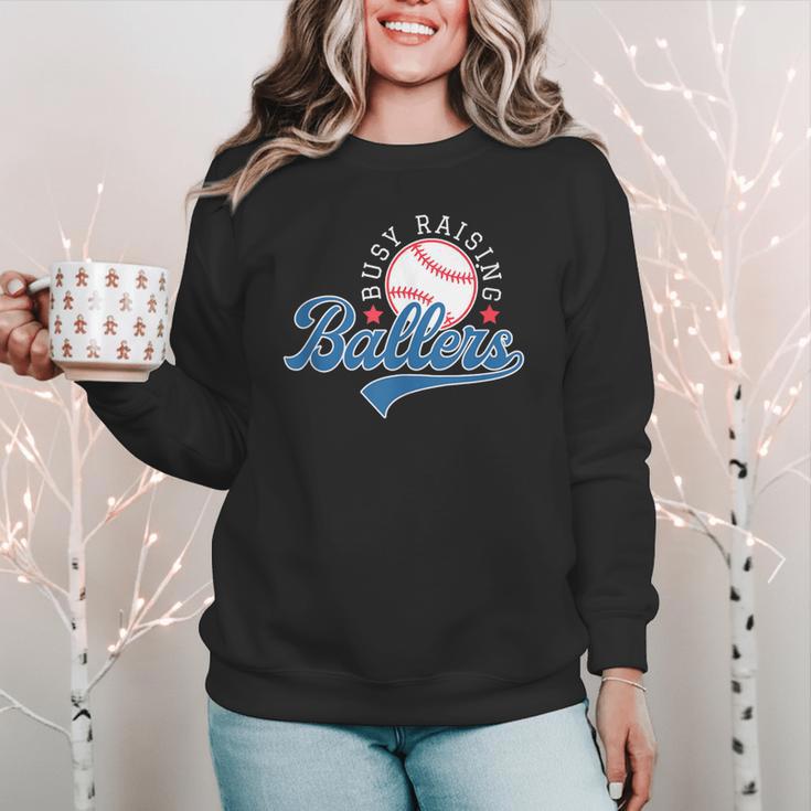 Busy Raising Ballers Baseball Mom Group Tee Women Crewneck Sweatshirt
