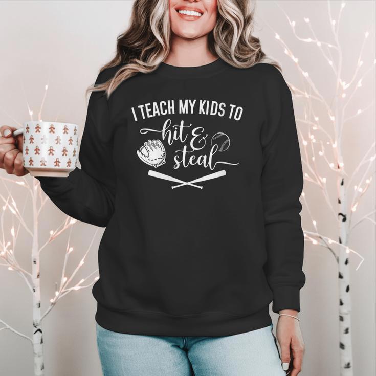 I Teach My Kids To Hit And Steal Baseball Mom Women Crewneck Sweatshirt