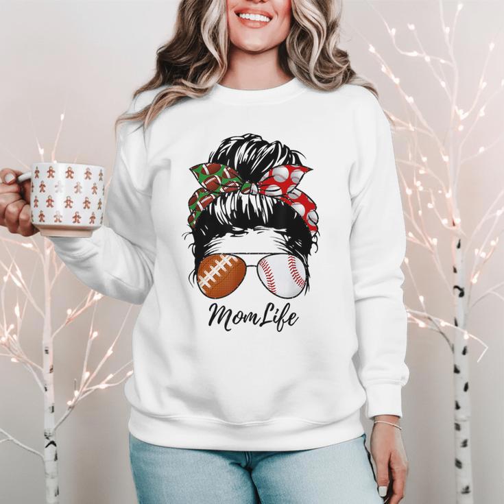 Football Mom Baseball Mom Life Messy Bun Mom Of Both Women Crewneck Sweatshirt Football Mom Baseball Mom Life Messy Bun Mom Of Both Women Crewneck Sweatshirt