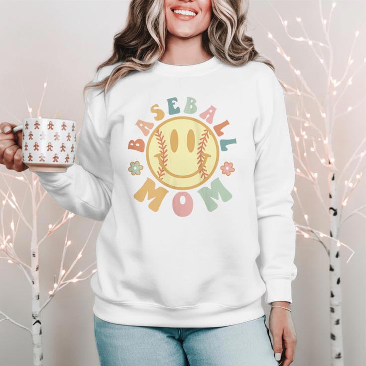 Groovy Retro Floral Happy Smiling Face Baseball Mom Women Crewneck Sweatshirt Groovy Retro Floral Happy Smiling Face Baseball Mom Women Crewneck Sweatshirt