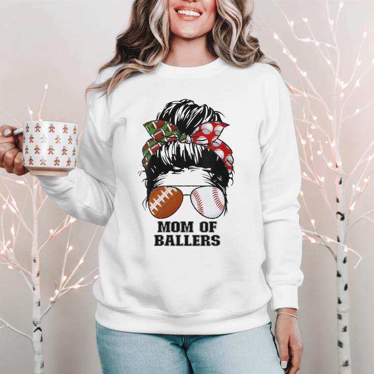 Mom Of Ballers Messy Bun Football Mom Baseball Mom Of Both Women Crewneck Sweatshirt