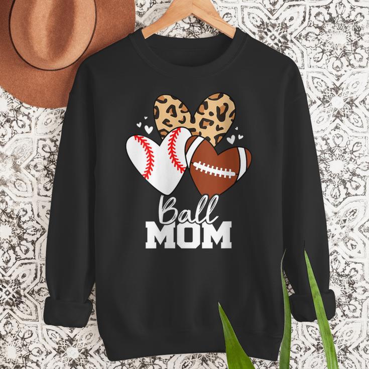 Ball Mom Football Baseball Mom Heart Women Crewneck Sweatshirt Ball Mom Football Baseball Mom Heart Women Crewneck Sweatshirt