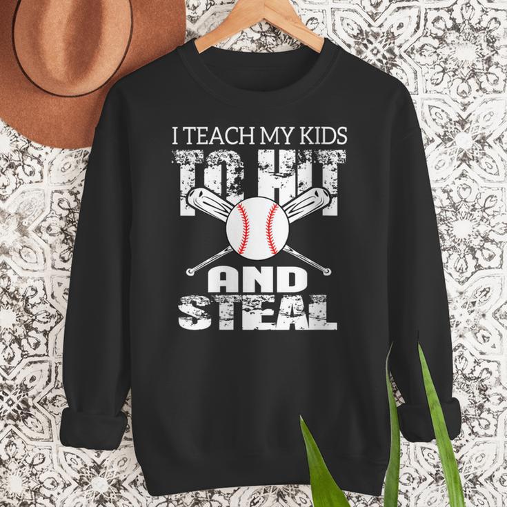Baseball Mom Quote I Teach My Kids To Hit And Steal Women Crewneck Sweatshirt Baseball Mom Quote I Teach My Kids To Hit And Steal Women Crewneck Sweatshirt