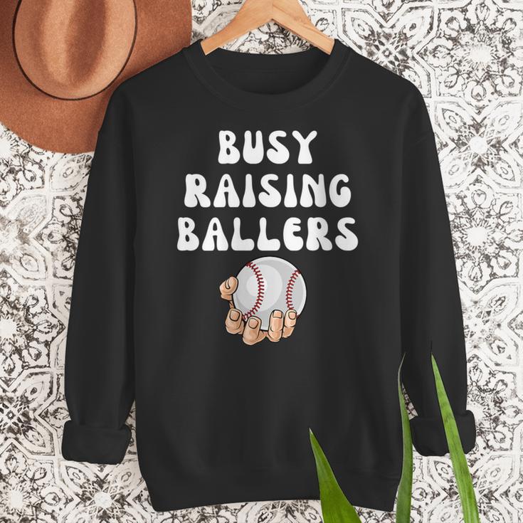 Busy Raising Ballers Baseball Mom Groovy Mother Day Women Crewneck Sweatshirt