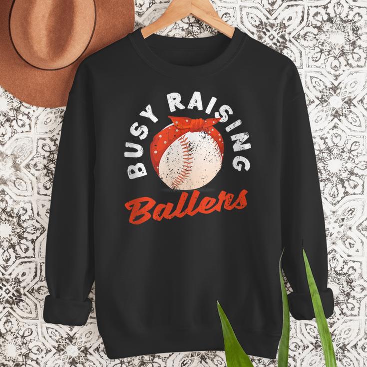 Busy Raising Ballers Baseball Mom Sons Women Crewneck Sweatshirt Busy Raising Ballers Baseball Mom Sons Women Crewneck Sweatshirt