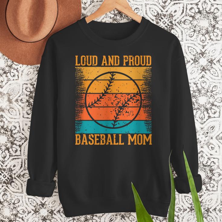 Loud And Proud Baseball Mom Vibrant Colorful Stripe Women Crewneck Sweatshirt Loud And Proud Baseball Mom Vibrant Colorful Stripe Women Crewneck Sweatshirt