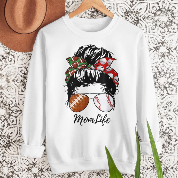 Football Mom Baseball Mom Life Messy Bun Mom Of Both Women Crewneck Sweatshirt Football Mom Baseball Mom Life Messy Bun Mom Of Both Women Crewneck Sweatshirt