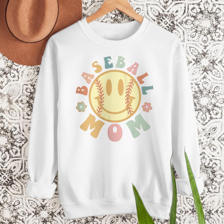 Groovy Retro Floral Happy Smiling Face Baseball Mom Women Crewneck Sweatshirt Groovy Retro Floral Happy Smiling Face Baseball Mom Women Crewneck Sweatshirt