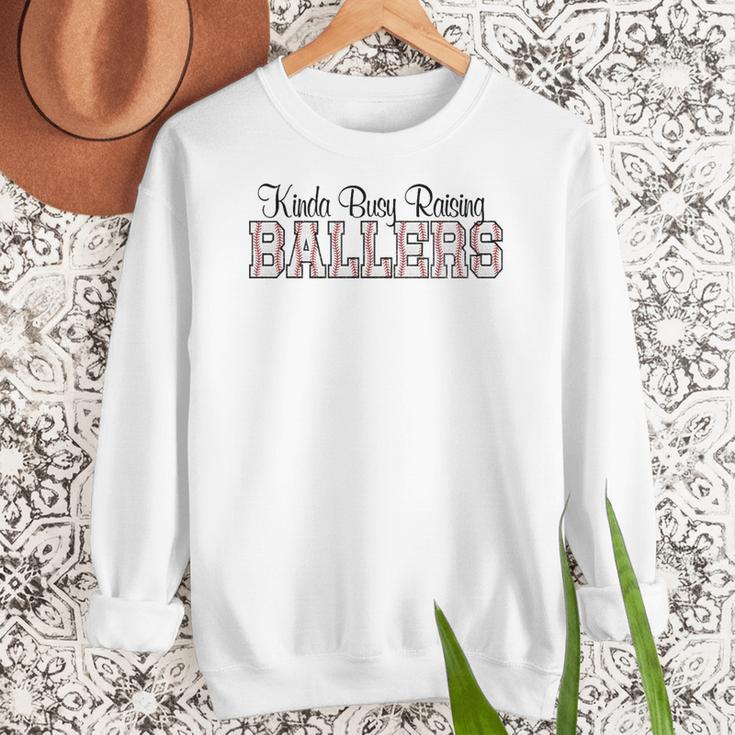 Kinda Busy Raising Ballers Funny Baseball Mom Mother's Day Premium Tri-Blend Women Crewneck Sweatshirt Kinda Busy Raising Ballers Funny Baseball Mom Mother's Day Premium Tri-Blend Women Crewneck Sweatshirt