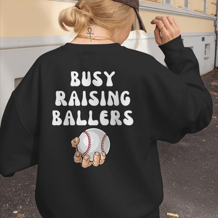Busy Raising Ballers Baseball Mom Groovy Mother Day Women's Sweatshirt Back Print