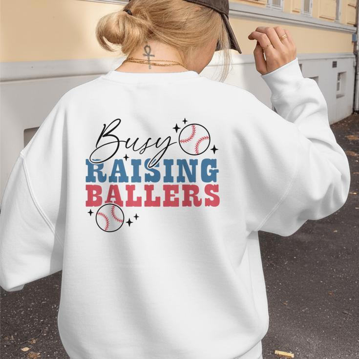 Busy Raising Ballers Retro Groovy Baseball Mom Outfit Women's Sweatshirt Back Print Busy Raising Ballers Retro Groovy Baseball Mom Outfit Women's Sweatshirt Back Print