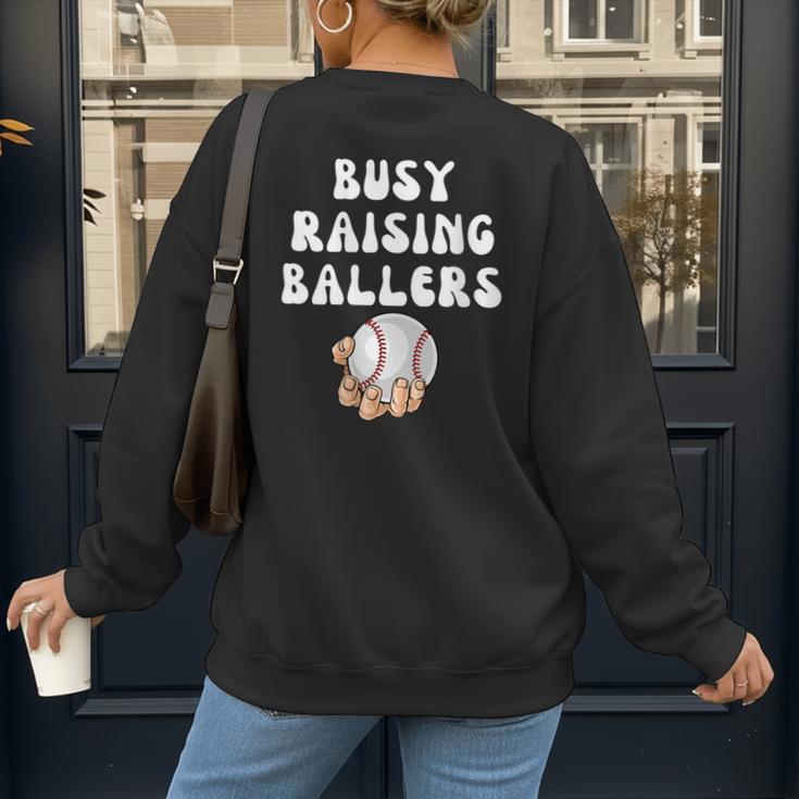 Busy Raising Ballers Baseball Mom Groovy Mother Day Women's Sweatshirt Back Print