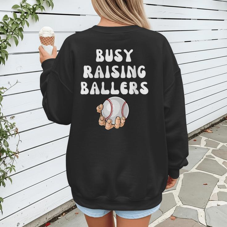 Busy Raising Ballers Baseball Mom Groovy Mother Day Women's Sweatshirt Back Print