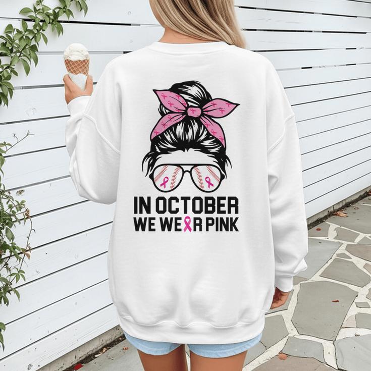 In October We Wear Pink Baseball Mom Messy Bun Breast Cancer Women's Sweatshirt Back Print