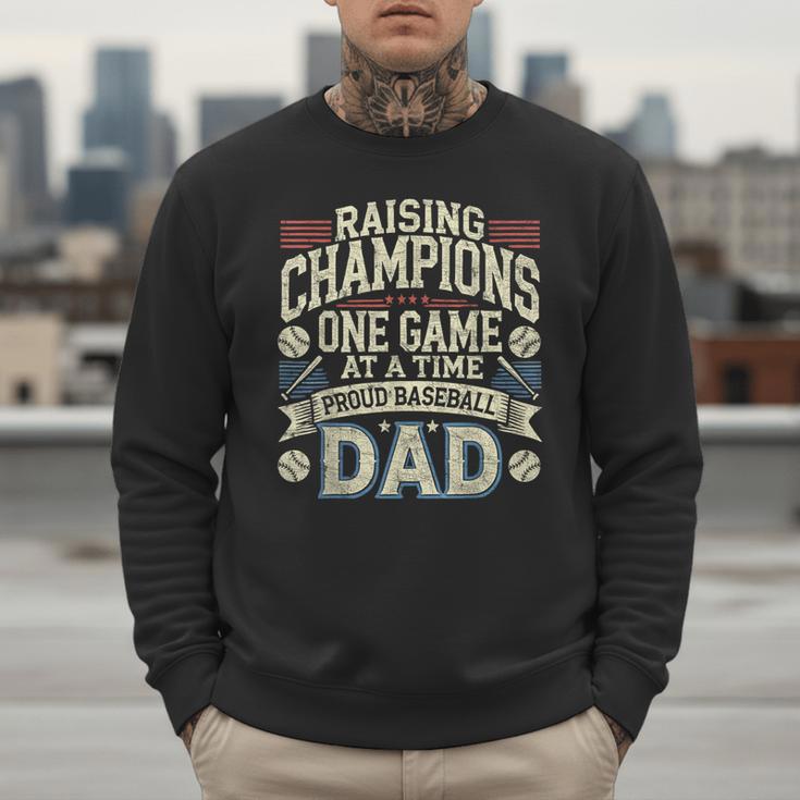 Proud Baseball Dad Raising Champions One Game At A Time Men Sweatshirt Proud Baseball Dad Raising Champions One Game At A Time Men Sweatshirt