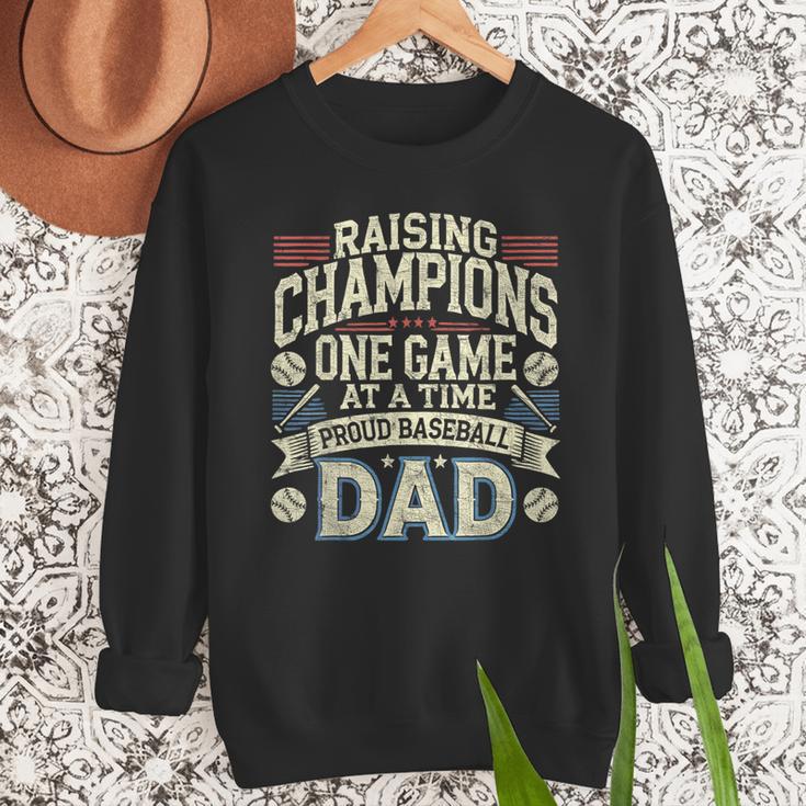Proud Baseball Dad Raising Champions One Game At A Time Men Sweatshirt Proud Baseball Dad Raising Champions One Game At A Time Men Sweatshirt