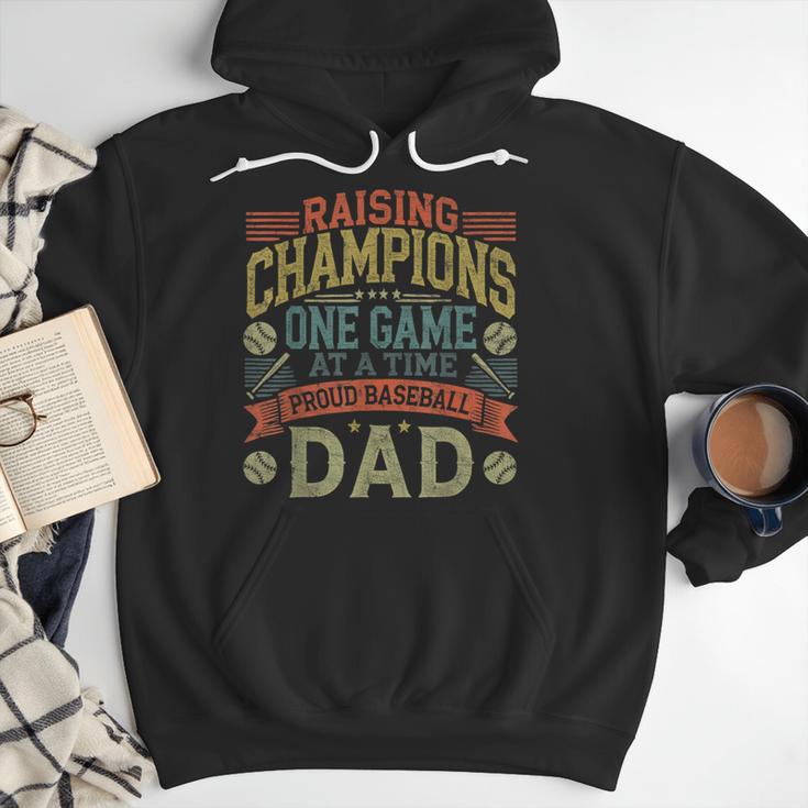 Raising Champions One Game At A Time Proud Baseball Dad Men Hoodie Raising Champions One Game At A Time Proud Baseball Dad Men Hoodie