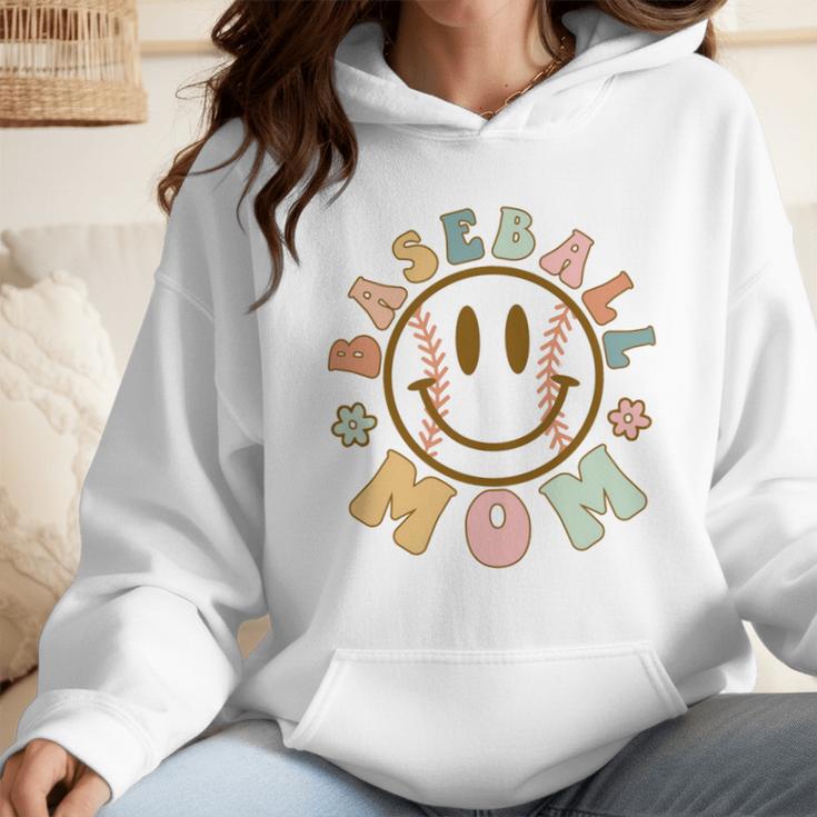 Happy Baseball Mom Groovy Retro Floral Smiling Face Wmen Hoodie Happy Baseball Mom Groovy Retro Floral Smiling Face Wmen Hoodie