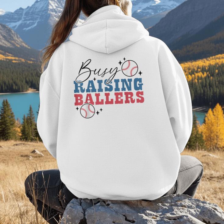 Busy Raising Ballers Retro Groovy Baseball Mom Outfit Women Hoodie Back Print