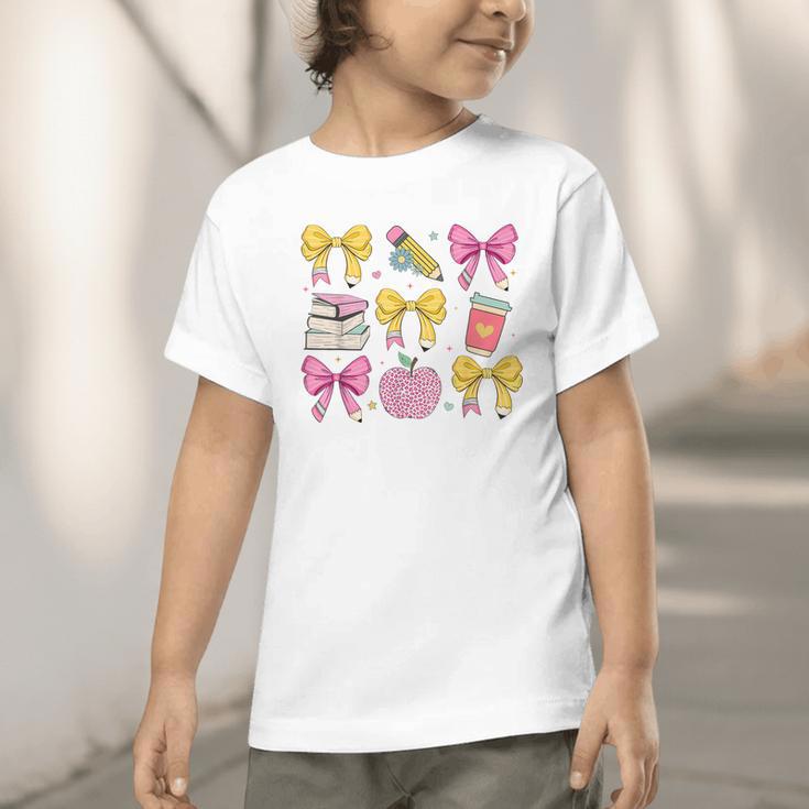 Apple Coquette Bow Books First Day Of School Back To School Graphic Toddler T-Shirt Apple Coquette Bow Books First Day Of School Back To School Graphic Toddler T-Shirt