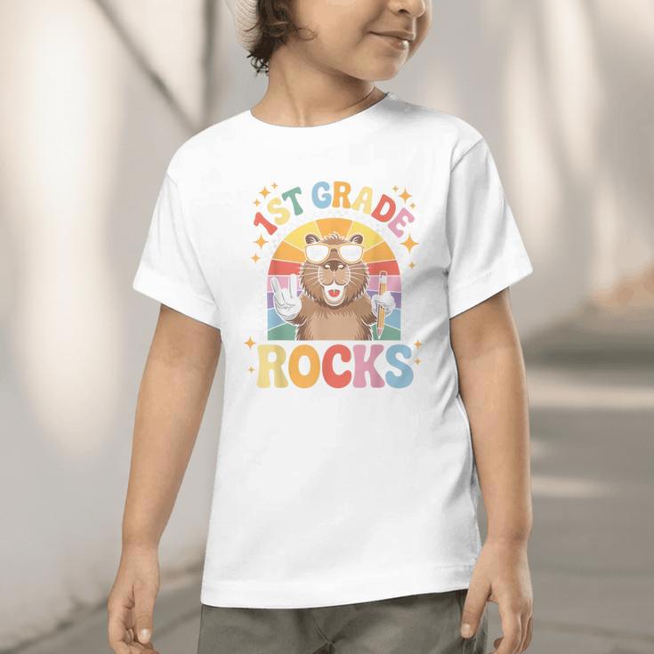 Back To School 1st Grade Capybara First Grade Rocks Graphic Toddler T-Shirt Back To School 1st Grade Capybara First Grade Rocks Graphic Toddler T-Shirt