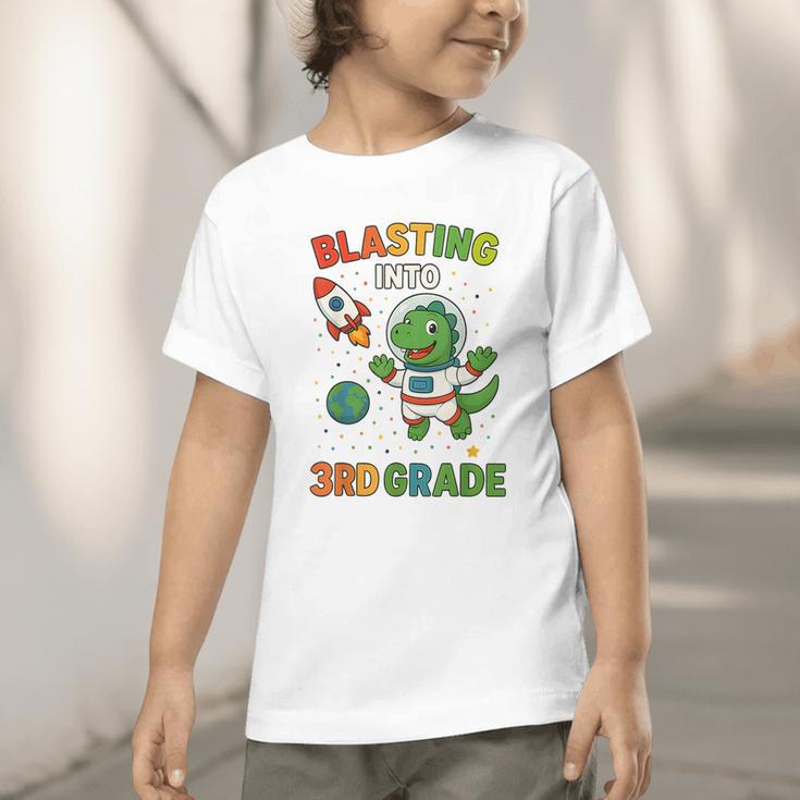 Blasting Into 3rd Grade Dinosaur Astronaut Back To School Graphic Toddler T-Shirt Blasting Into 3rd Grade Dinosaur Astronaut Back To School Graphic Toddler T-Shirt