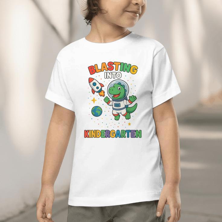 Blasting Into Kindergarten Dinosaur Astronaut Back To School Graphic Toddler T-Shirt Blasting Into Kindergarten Dinosaur Astronaut Back To School Graphic Toddler T-Shirt
