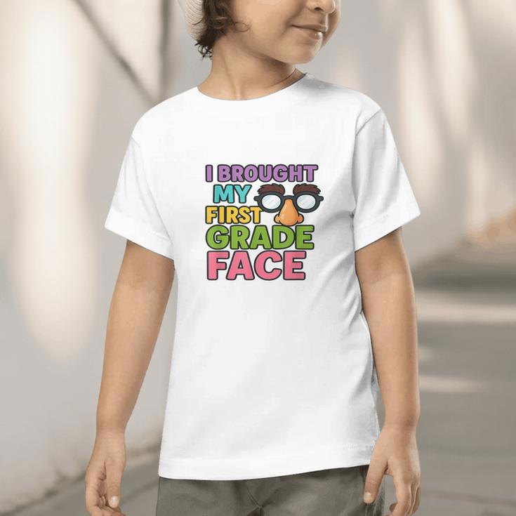 I Brought My First Grade Face First Day Back To School Graphic Toddler T-Shirt I Brought My First Grade Face First Day Back To School Graphic Toddler T-Shirt
