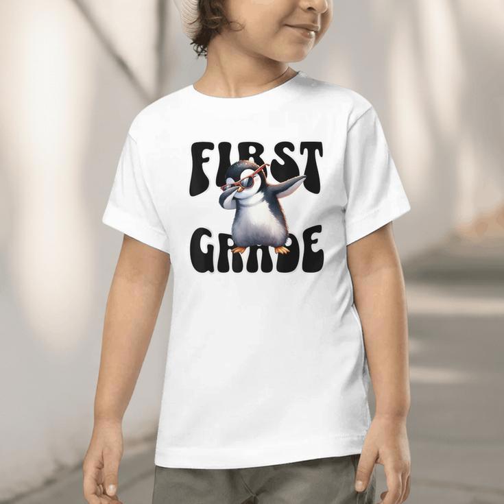 Cute Dabbing Penguin First Grade Back To School Graphic Toddler T-Shirt Cute Dabbing Penguin First Grade Back To School Graphic Toddler T-Shirt