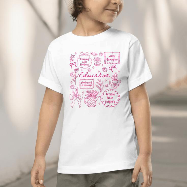 Educator Love Inspire Teach Pink Bow Back To School Graphic Toddler T-Shirt Educator Love Inspire Teach Pink Bow Back To School Graphic Toddler T-Shirt