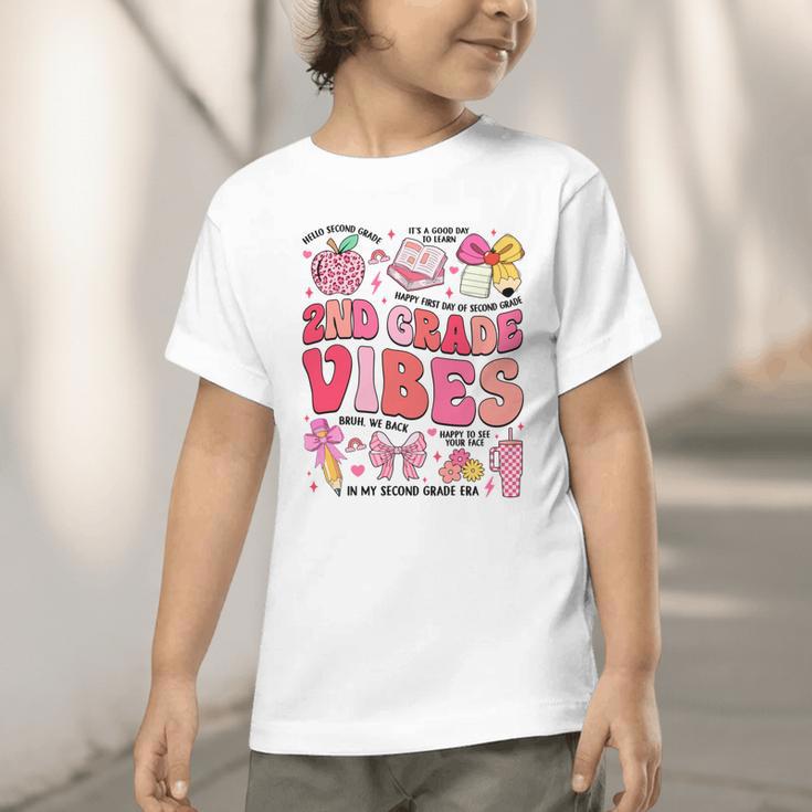 Girls 2nd Grade Vibes Coquette Pink Bow Back To School Graphic Toddler T-Shirt Girls 2nd Grade Vibes Coquette Pink Bow Back To School Graphic Toddler T-Shirt
