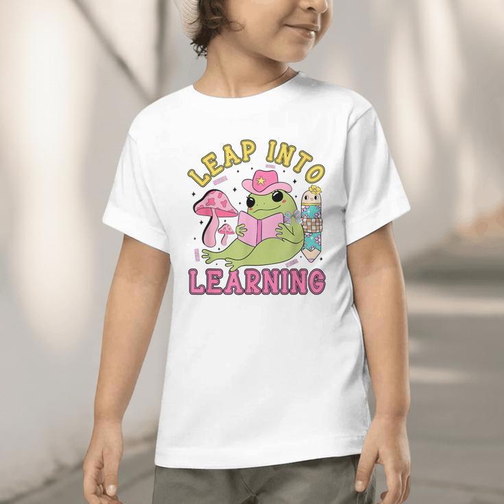 Leap Into Learning Cute Frog Kawaii Back To School Kids Graphic Toddler T-Shirt Leap Into Learning Cute Frog Kawaii Back To School Kids Graphic Toddler T-Shirt