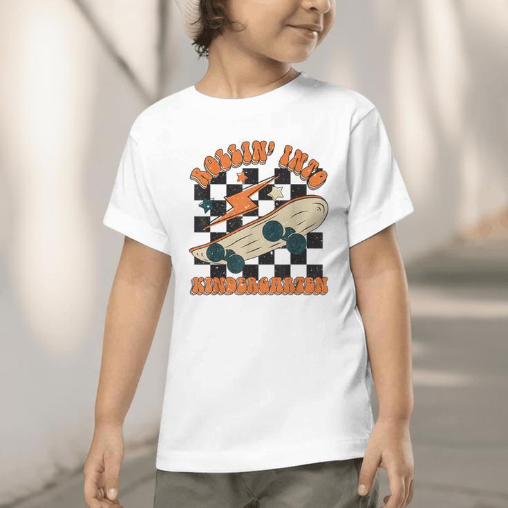 Rolling Into Kindergarten Retro Groovy Back To School Kids Graphic Toddler T-Shirt Rolling Into Kindergarten Retro Groovy Back To School Kids Graphic Toddler T-Shirt